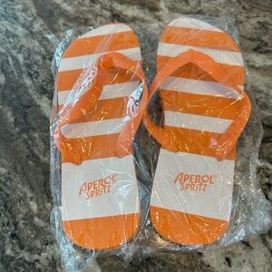 BNWT Aperol Spritz Orange and White Flip Flops, size 9 1/2